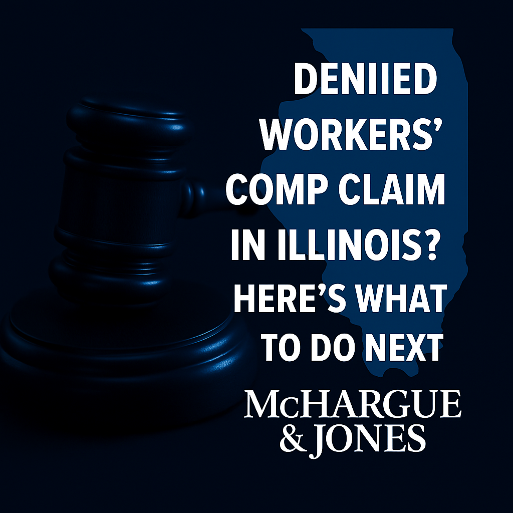 Dark blue graphic with a judge’s gavel and outline of Illinois beside white text, ‘Denied Workers’ Comp Claim in Illinois? Here’s What to Do Next’ above the McHargue & Jones logo.